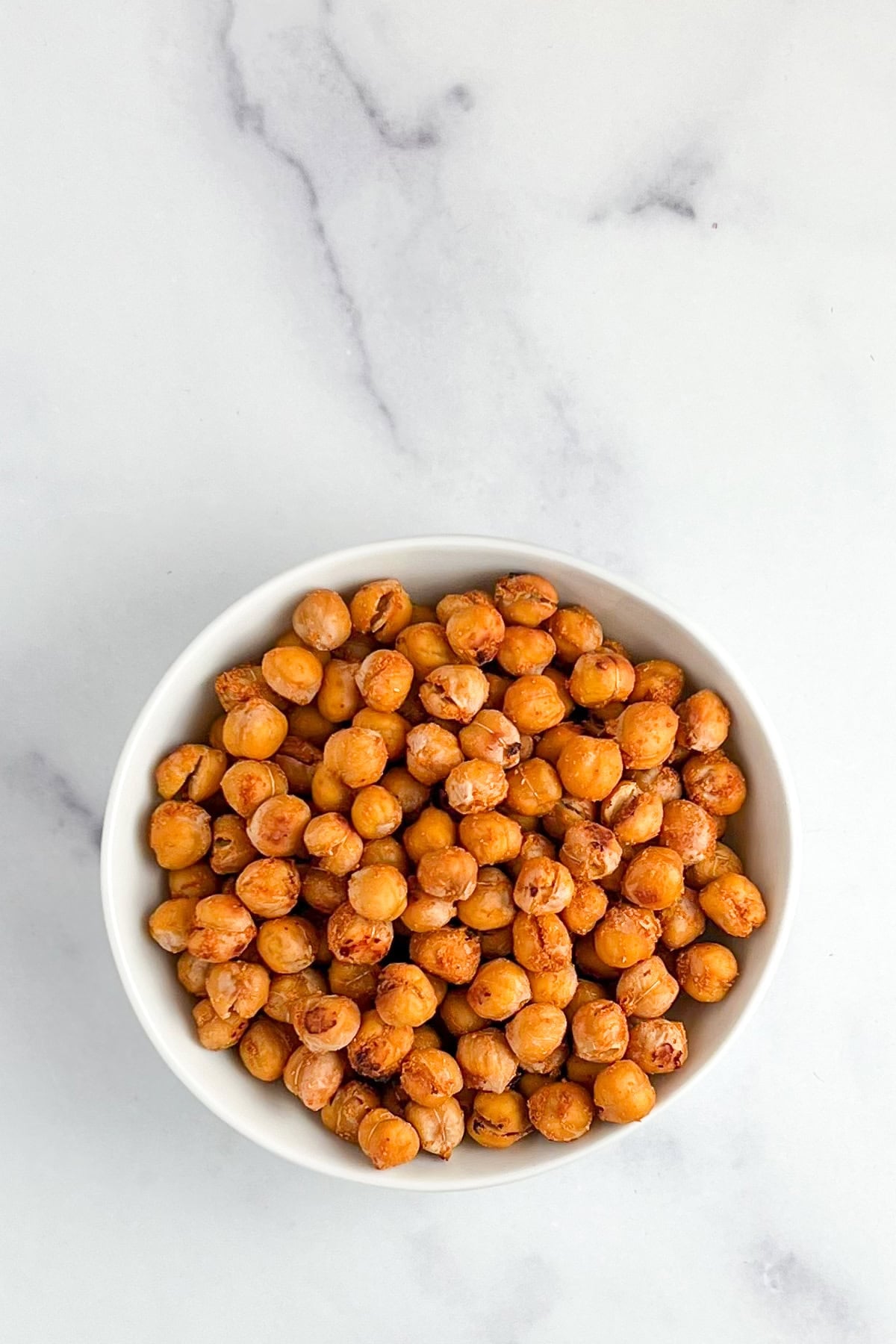A bowl of roasted chickpeas.