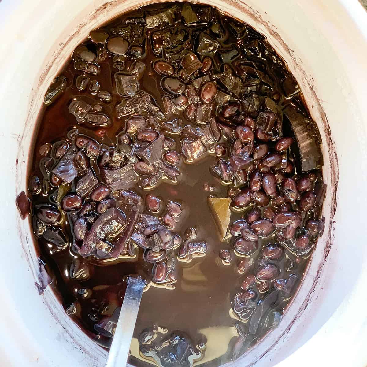 Cuban black beans that have been cooked in a slow cooker.