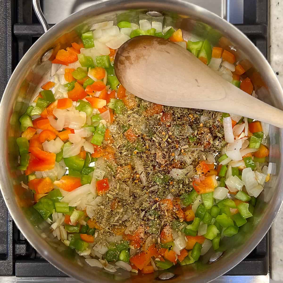 Dried seasonings added to the pan with sauteed veggies.
