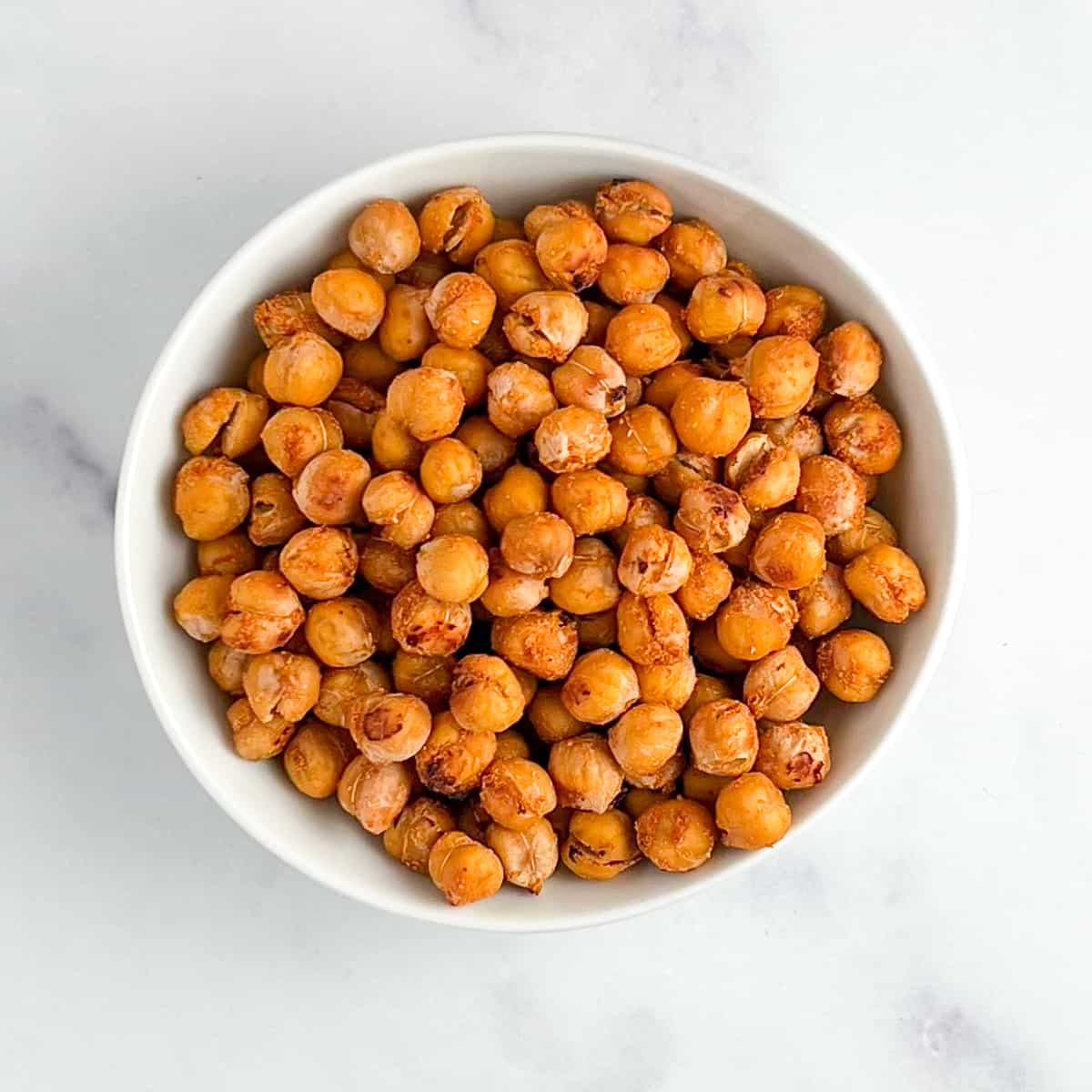 top view of a bowl of roasted chickpeas