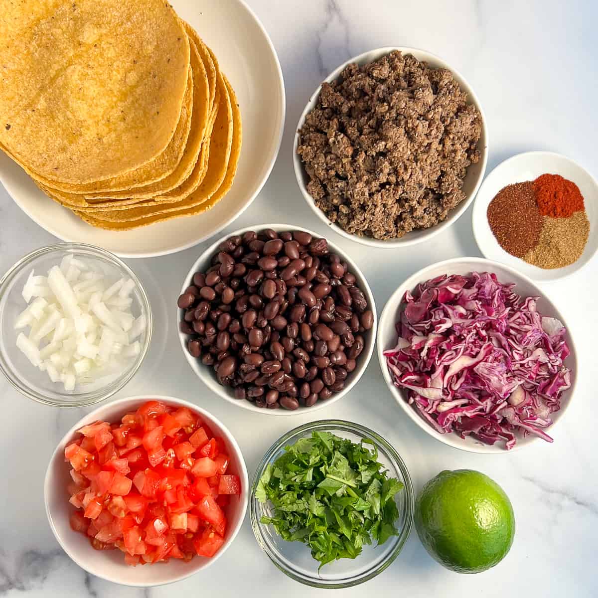 top view of the ingredients needed to make vegan black bean tacos