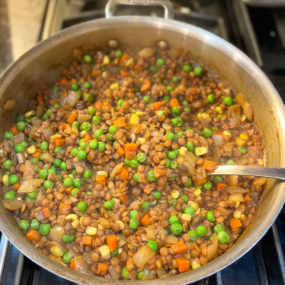 lentil and veggie filling for vegan shepherd's pie in a large sauté pan