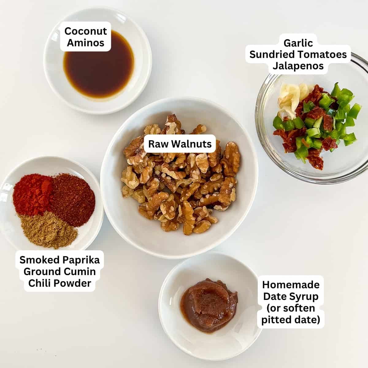 Ingredients for vegan taco meat: walnuts, coconut aminos, jalapeno, sundried tomato, garlic, date syrup, spices.