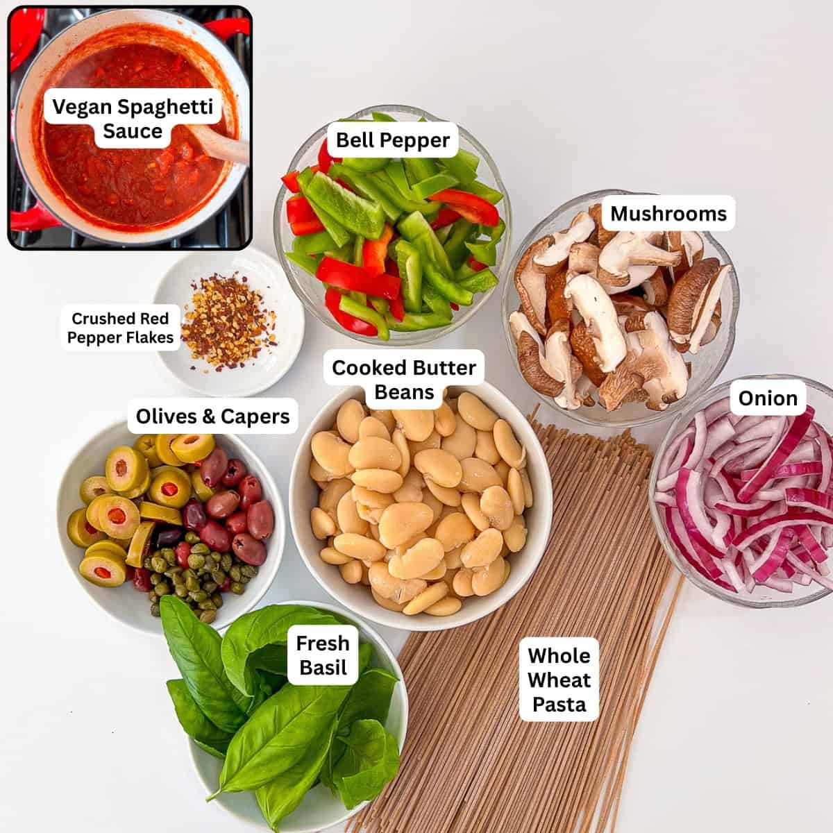 Vegan Puttanesca ingredients: vegan spaghetti sauce, bell peppers, mushrooms, onion, butter beans, olives, capers, basil, and whole wheat pasta.