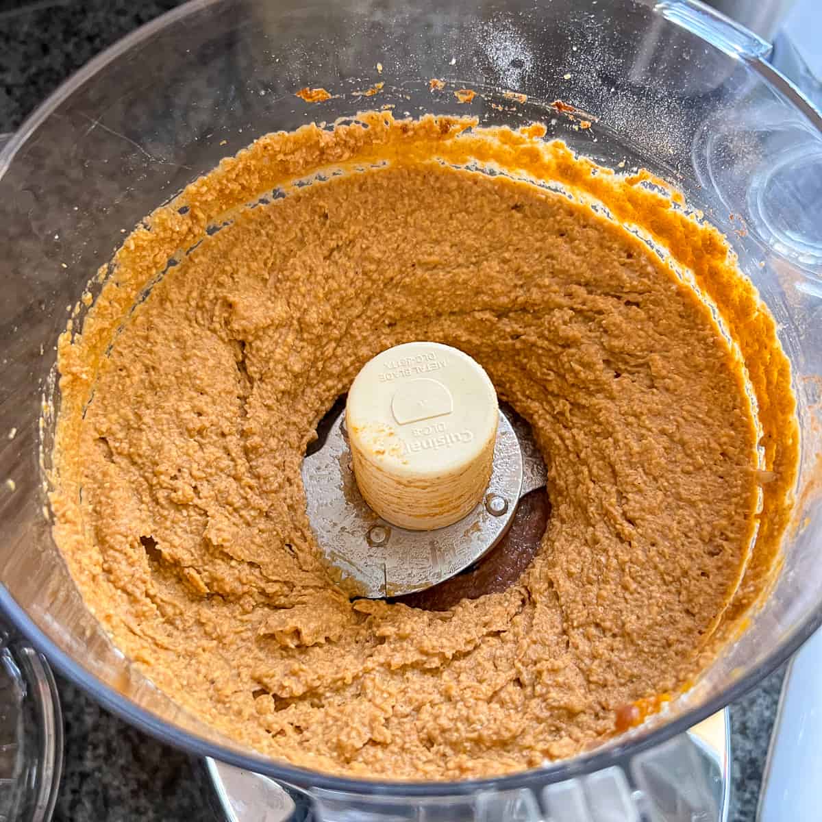 top view of a food processor with the mixture that's been processed