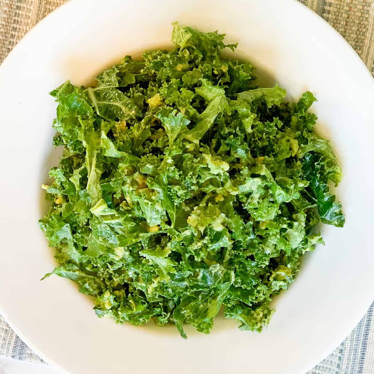 Kale avocado salad in a bowl.