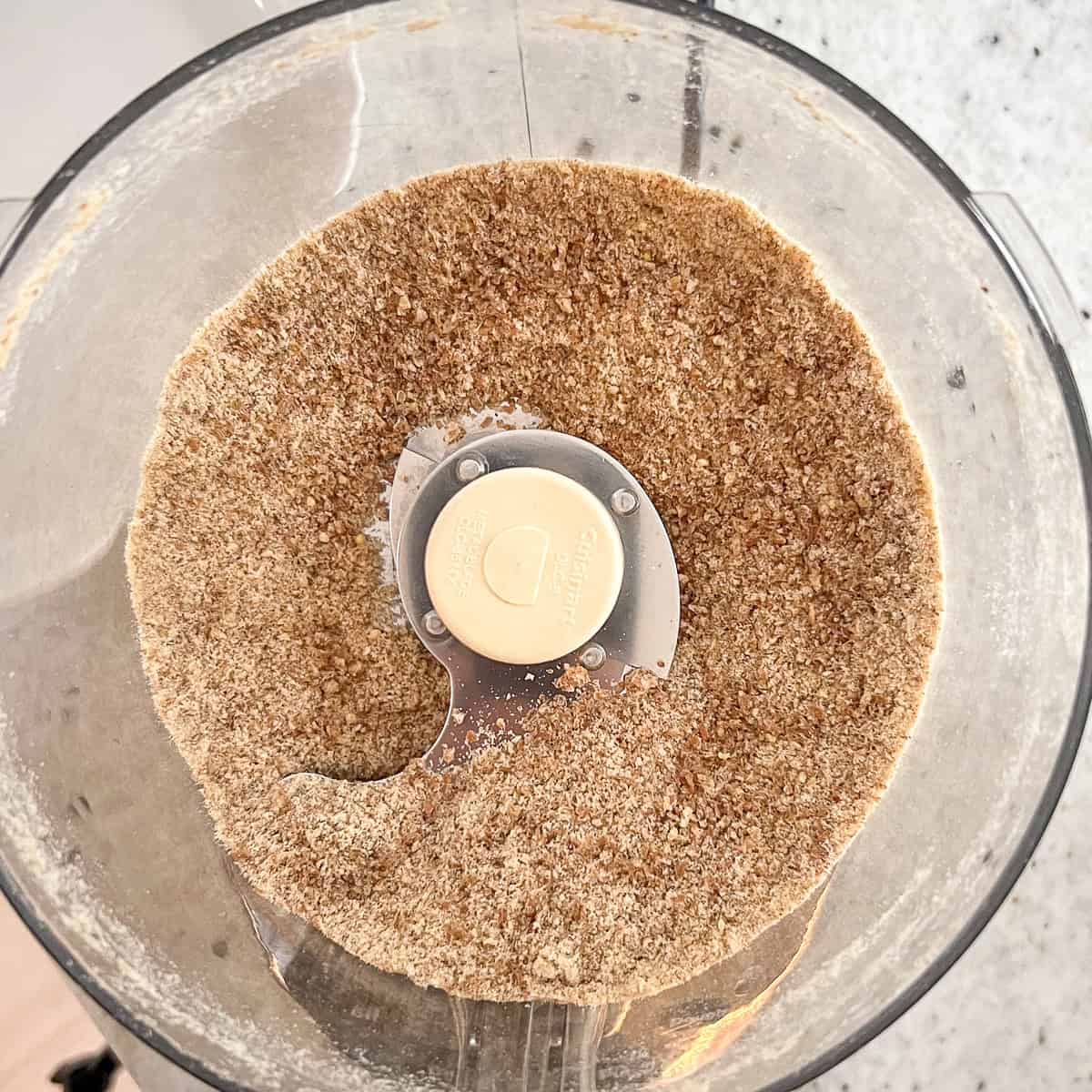 Bread that has been processed in a food processor into bread crumbs.