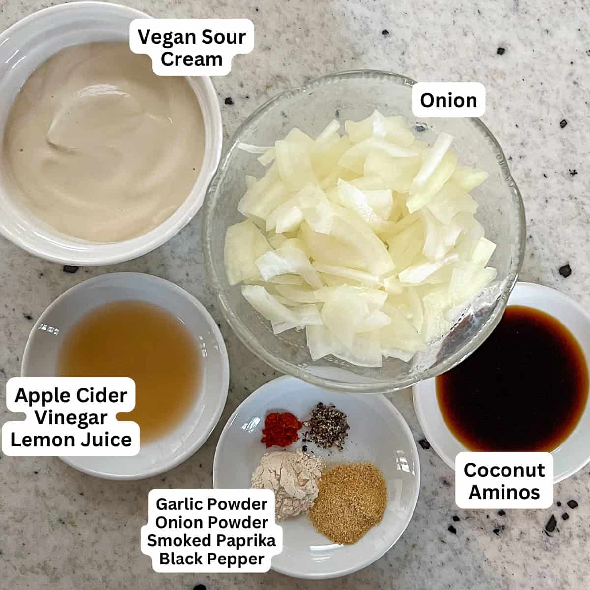 Ingredients for dairy free onion dip: onions, cashew sour cream, seasonings and spices.
