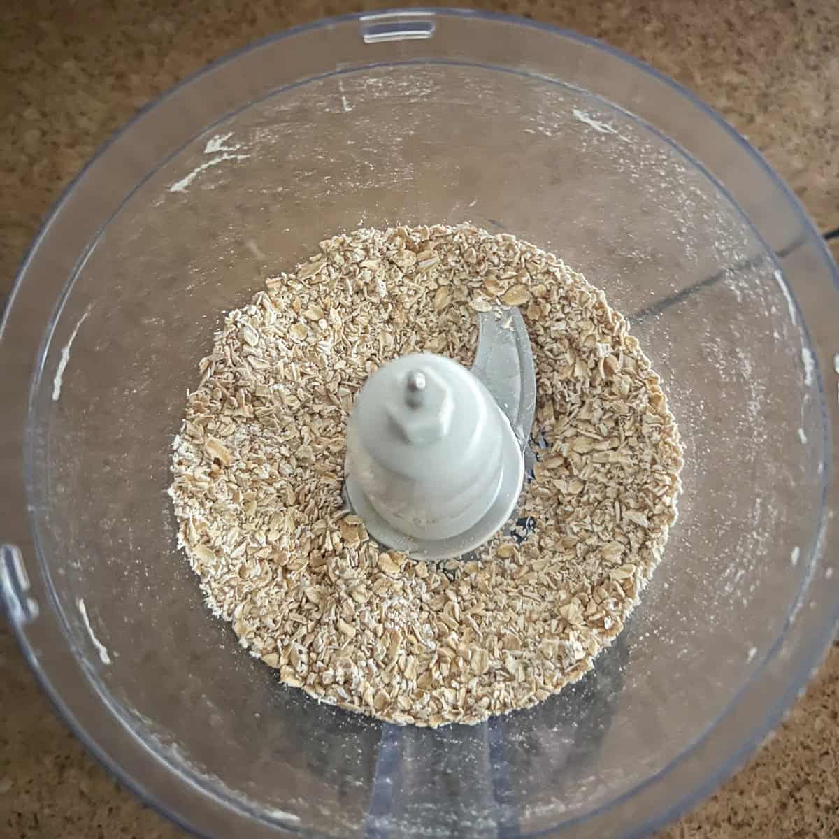 Rolled oats that have been processed in a food processor.