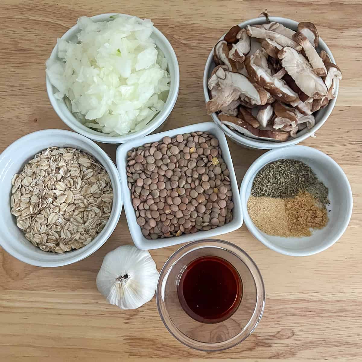 Ingredients for vegan Swedish meatballs: brown lentils, mushrooms, onions, oats, garlic, coconut aminos, spices.