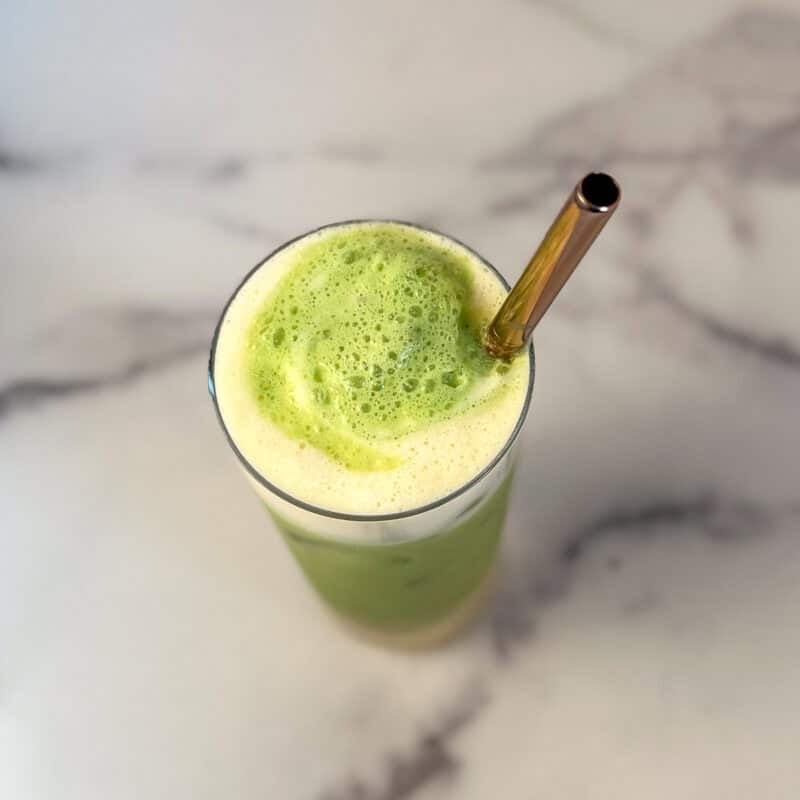 Pineapple Matcha latte with straw