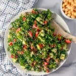 A tabouli salad with a side bowl of chickpeas.