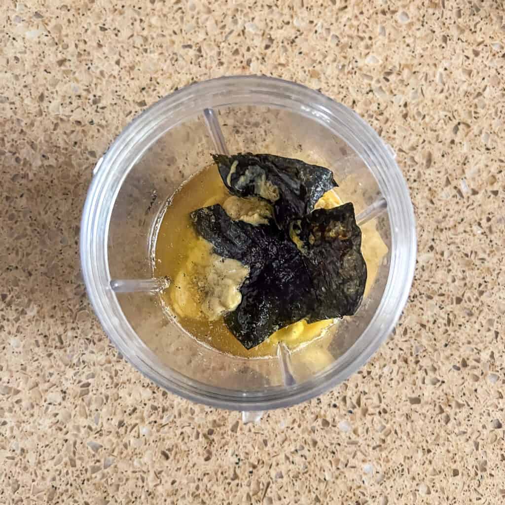 Vegan Caesar dressing ingredients in a small blender.