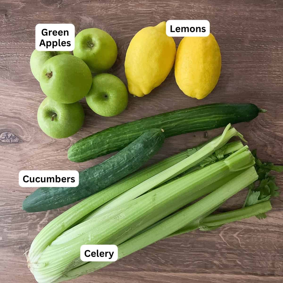 Celery, cucumbers, green apples and lemons.