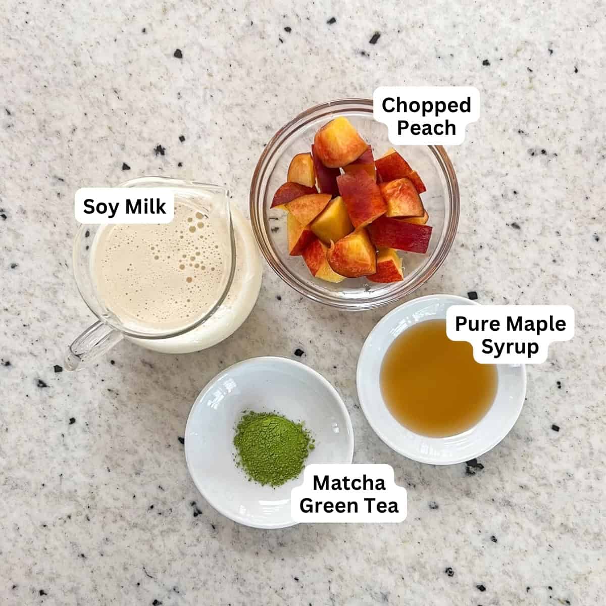 Ingredients for peach matcha latte: peaches, soy milk, pure maple syrup and matcha.