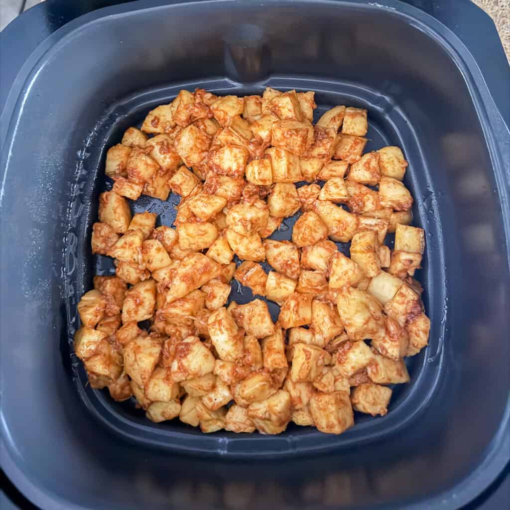 Kelewele in the air fryer basket prior to cooking.