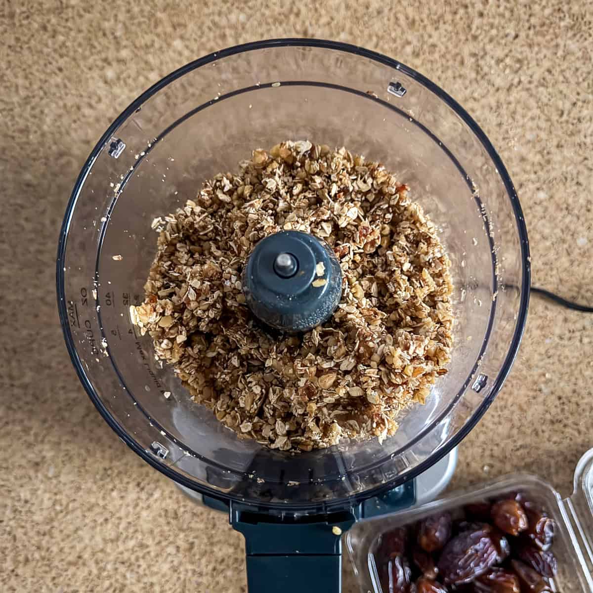 Walnut oat mixture for the crust after it has been processed in a food processor.