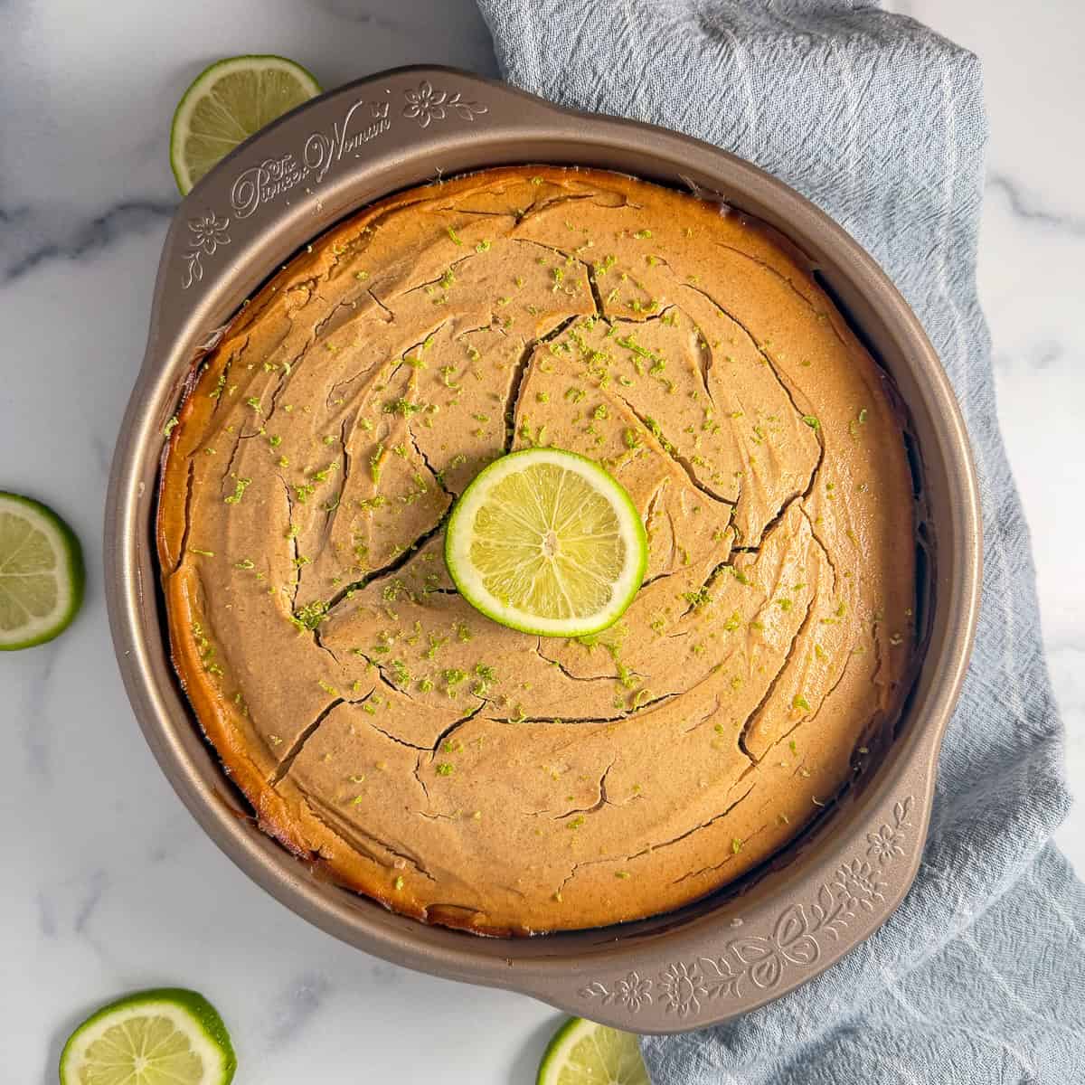 Vegan lime pie after baking with a lime slice on top.